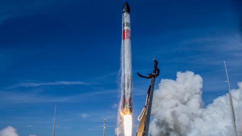 In this image supplied by Rocket Lab, the Electron rocket blasts off for its "There And Back Again" mission from their launch pad on the Mahia Peninsula, New Zealand, Tuesday, May 3 local time. The California-based company regularly launches 18-meter (59-foot) rockets from the remote Mahia Peninsula in New Zealand to deliver satellites into space. (Rocket Lab via AP)