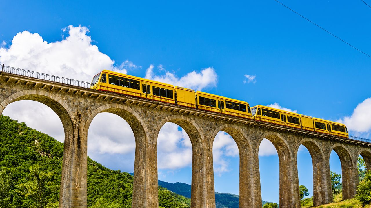 The Little Yellow Train (Train Jaune) provides a scenic view of the Pyrennees. 