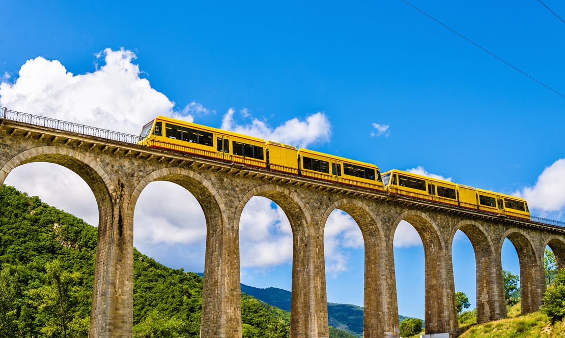 The Little Yellow Train (Train Jaune) provides a scenic view of the Pyrennees. 
