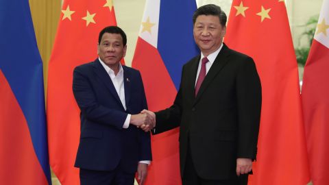 Philippine President Rodrigo Duterte shakes hands with Chinese President Xi Jinping before their meeting at the Great Hall of the People in Beijing on April 25, 2019.