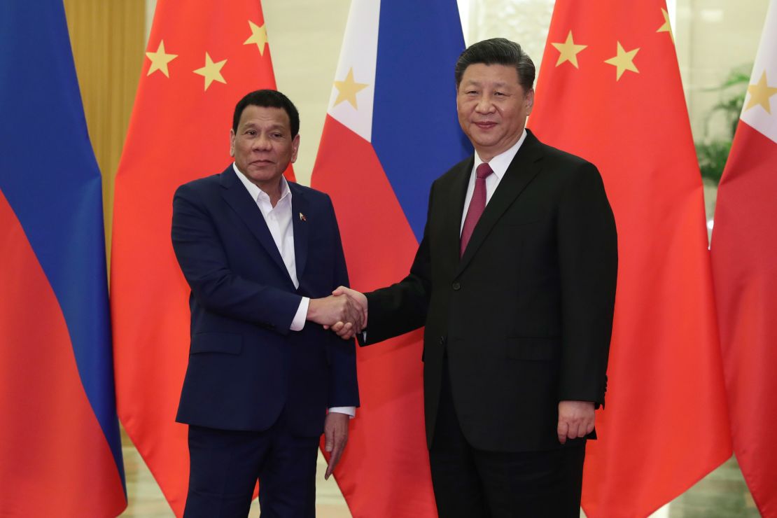 Philippine President Rodrigo Duterte shakes hands with Chinese President Xi Jinping before their meeting at the Great Hall of People in Beijing on April 25, 2019.