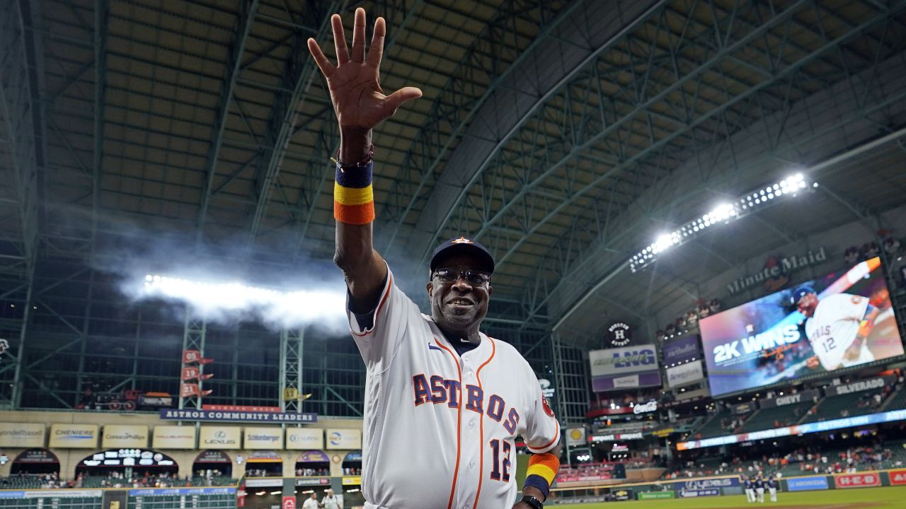 Dusty Baker celebrates after the Houston Astros beat the Seattle Mariners, becoming the first Black manager in MLB history to win 2,000 career games.