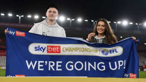 Brooks celebrates Bournemouth's promotion to the Premier League. 