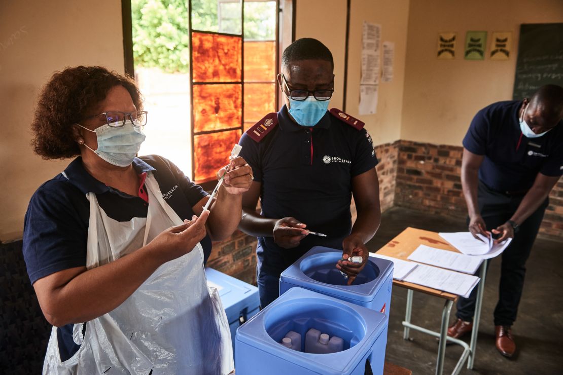 Health workers prepare doses of the Covid-19 vaccine during a rural vaccination drive in Mpumalanga, South Africa, in early March. 