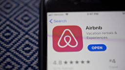 The Airbnb Inc. application is displayed in the App Store on an Apple Inc. iPhone in an arranged photograph taken in Arlington, Virginia, U.S., on Friday, March 8, 2019. Airbnb agreed to buy HotelTonight, its biggest acquisition yet, in a move to increase hotel listings on the site ahead of an eventual initial public offering for the home-sharing startup. Photographer: Andrew Harrer/Bloomberg via Getty Images