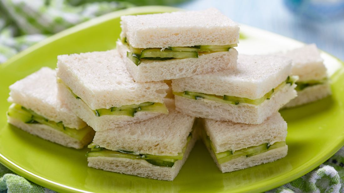 <strong>Cucumber sandwich, United Kingdom:</strong> So fancy! Extra soft white bread with the crusts removed gets layered with razor-thin English cucumbers (peeled, please, then lightly salted and drained), butter and a light dusting of fine pepper.