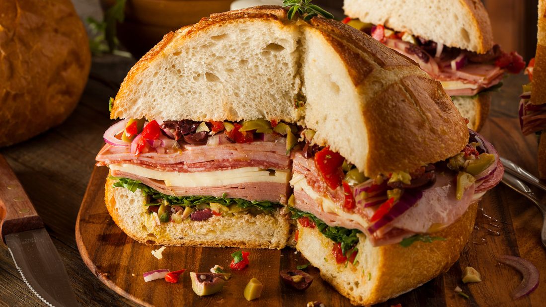 <strong>Muffaletta, United States (New Orleans): </strong>In the NOLA classic, layers of chopped olives, Genoa salami, ham and various cheeses (often with Swiss and provolone) mingle.