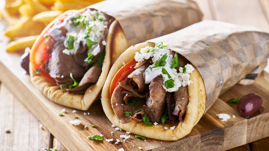 <strong>Shawarma, Middle East: </strong>While there are many variations, its base is grilled spiced meat shaved from a rotisserie and tucked into a light sleeve of pita bread, topped with things such as tomatoes, onions and parsley.