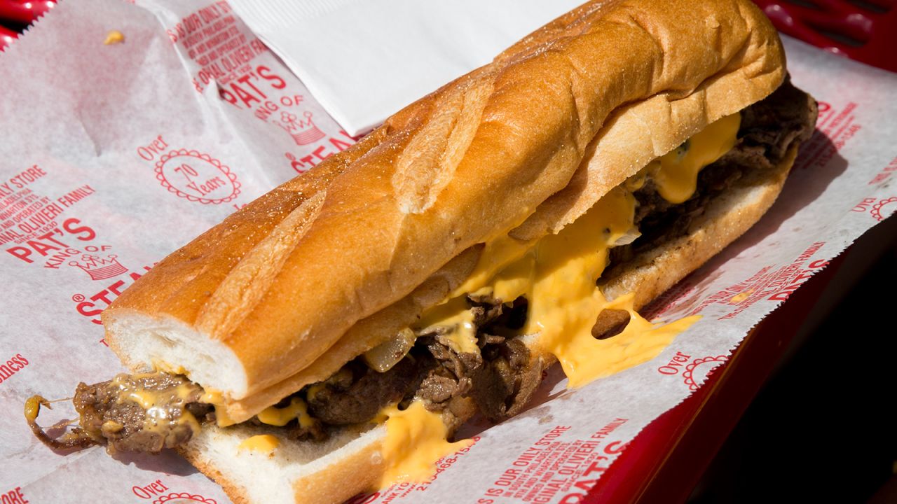 <strong>Philly cheesesteak, United States (Philadelphia): </strong>This delectable hot mess is layered with ribeye steak sliced thin, oozing with cheese, sauteed peppers and onions to your liking. 