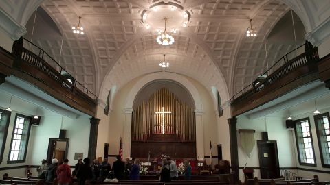 Visitors tour the church in 2015.