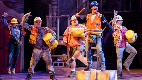 Growing up, Valdovinos says he frequently worked with his father's construction business. Here construction workers are center stage in a  scene from 