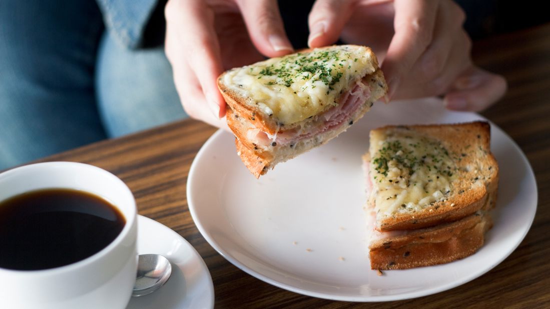 <strong>Croque monsieur, France:</strong> It comes in male and female versions. For the croque monsieur, slices of white bread are topped with grated cheese and stuffed with thinly sliced ham and emmental or gruyere inside are dipped into egg batter and fried. For the croque madame, the egg component is served fried atop the sandwich instead. 