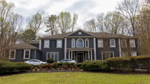 The six-bedroom home sits on a hill in a gated community south of Atlanta, away from prying neighbors and fans who might pop in unannounced.