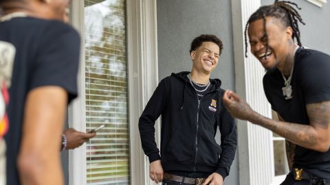 Noah Webster, center, shares a laugh with fellow Collab Crib members Tray Bills and Cameron Lee.