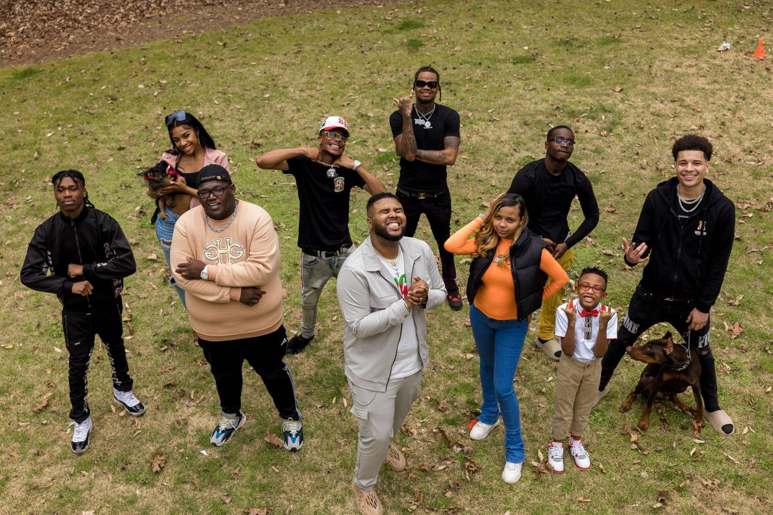 The Collab Crib members pose for a photo in their backyard.