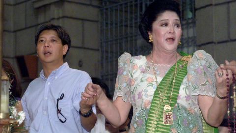 Former Philippine first lady Imelda Marcos, the widow of dictator Ferdinand Marcos, with her son Ferdinand Marcos Jr. celebrating her 70th birthday in Manila.