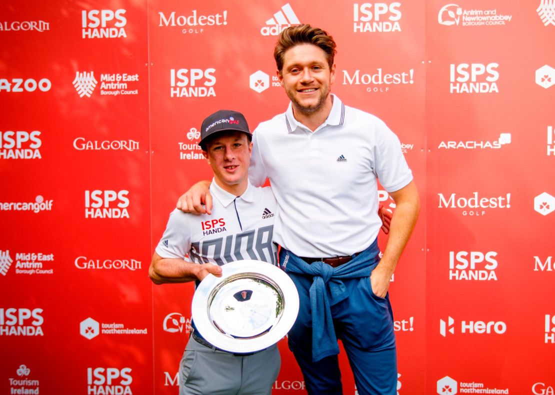 Lawlor poses with the World Disability Invitational trophy with Niall Horan.