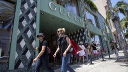Shoppers outside Gucci store on Rodeo Drive in Beverly Hills, California, U.S., on Tuesday, June 15, 2021. The store is one of several locations that will begin accepting cryptocurrency payments at the end of May. Photographer: Jill Connelly/Bloomberg via Getty Images