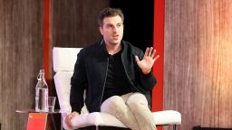 MIAMI, FLORIDA - FEBRUARY 16: CEO of Airbnb, Brian Chesky speaks on stage during Pivot MIA at 1 Hotel South Beach on February 16, 2022 in Miami, Florida. (Photo by Alexander Tamargo/Getty Images for Vox Media)