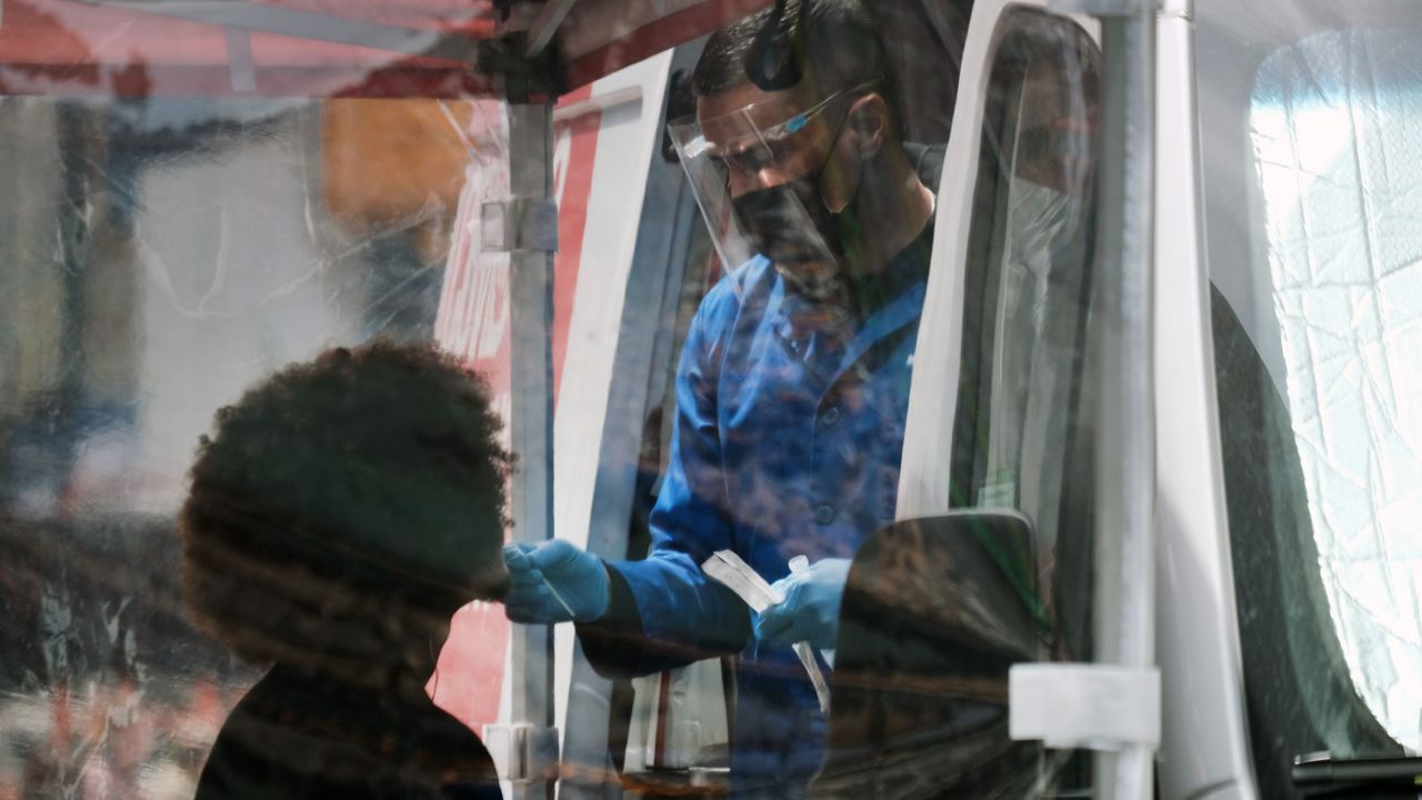 A person receives testing for the coronavirus this week from a van in New York's Times Square.
