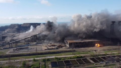 In this image taken from video, smoke rises over the Azovstal steel plant after Russian shelling in Mariupol, Ukraine, on Thursday, May 5. The Ukrainians holed up in the last bastion of Mariupol <a href=