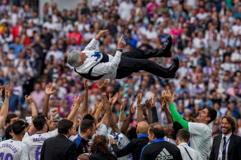 Real Madrid players toss manager Carlo Ancelotti into the air as they celebrate winning the Spanish league title on Saturday, April 30. A few days later, the club booked their spot in the Champions League final with a <a href=