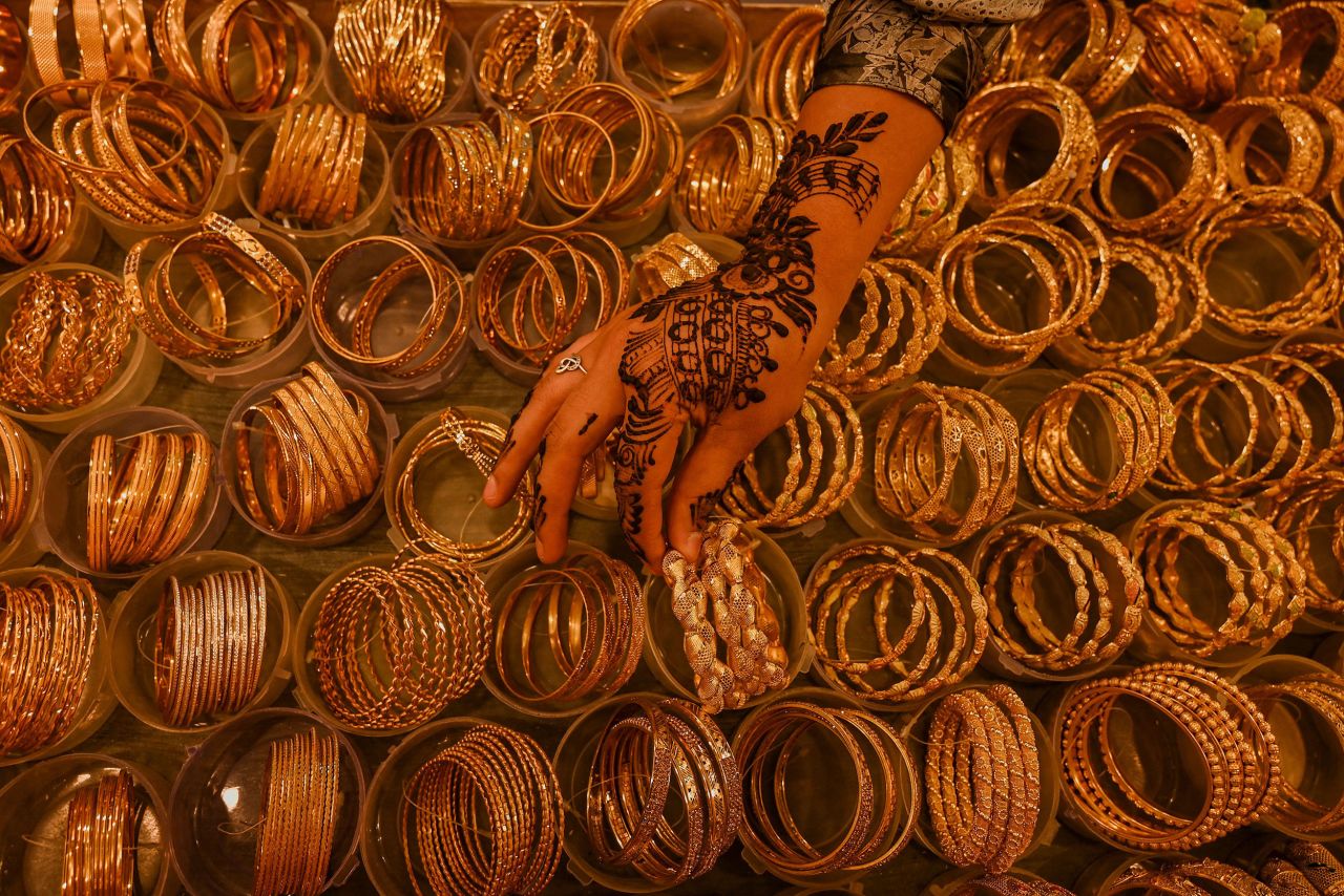 A shopper in Srinagar, India, checks out ornaments at a market ahead of Eid al-Fitr, the holiday marking the end of the Muslim holy month of Ramadan, on Sunday, May 1.