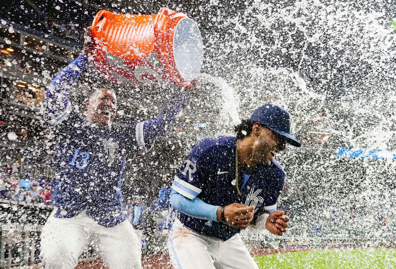 Kansas City's MJ Melendez is doused by teammate Salvador Perez after a win against St. Louis on Tuesday, May 3.