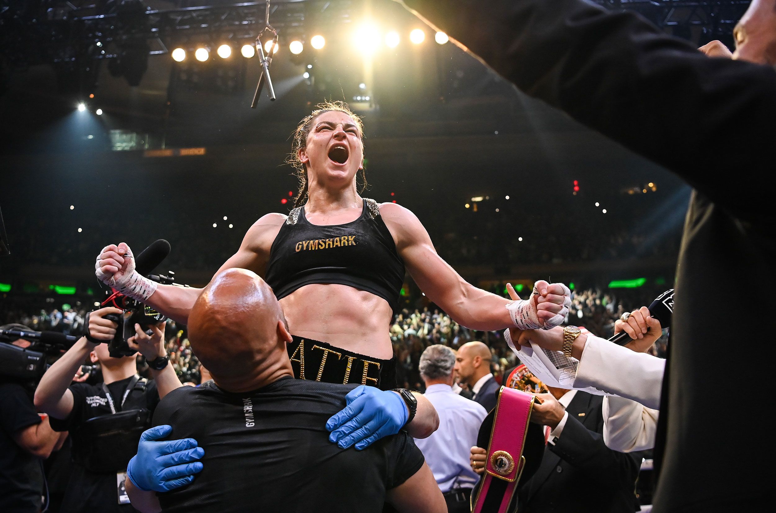 Boxer Katie Taylor celebrates her victory.