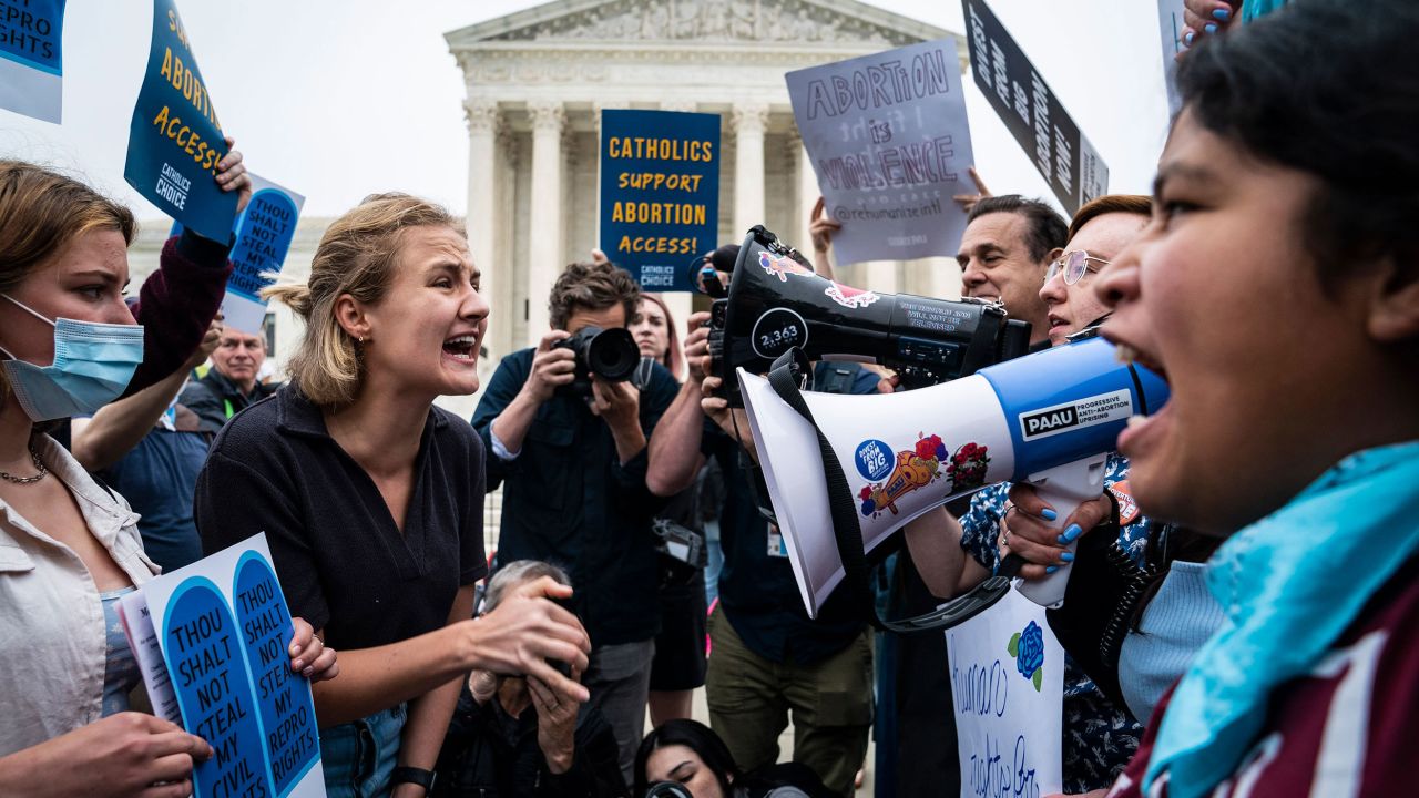 Supporters and opponents of abortion rights demonstrate outside the US Supreme Court in Washington, DC, on May 3, 2022. 