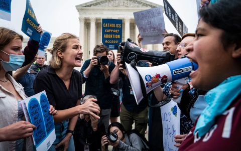 Abortion rights advocates and abortion rights opponents demonstrate outside of the US Supreme Court on Tuesday, May 3.
