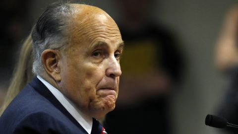 Rudy Giuliani looks on during an appearance before the Michigan House Oversight Committee in Lansing, Michigan, on December 2, 2020. 