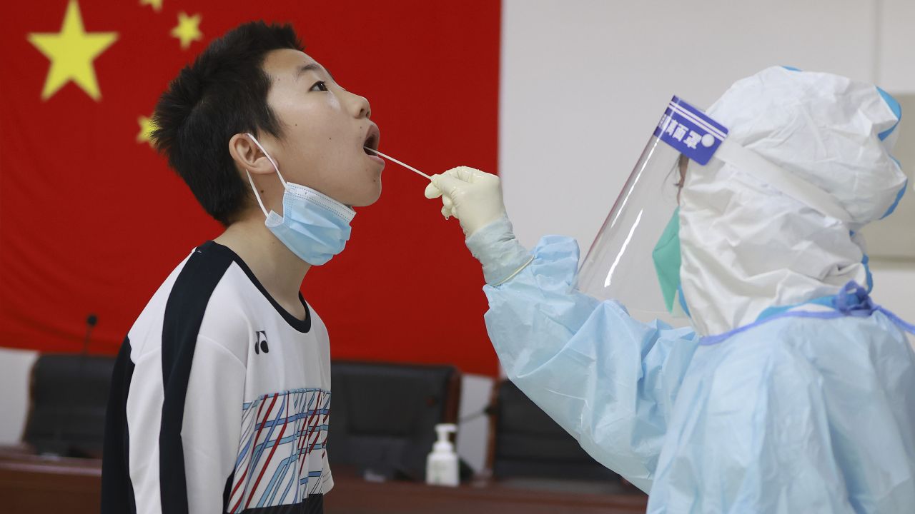 A boy receiving a Covid test in Beijing, China on May 4.