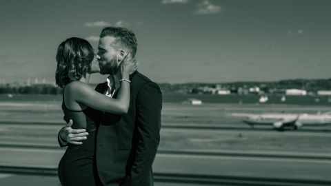 Burton and Solberg posed for engagement photos at Reagan National Airport in Washington DC.