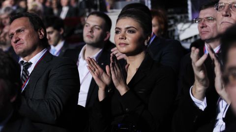 Kabaeva applauds as then-Prime Minister Vladimir Putin (not pictured) addresses the United Russia Party November 27, 2011 in Moscow.