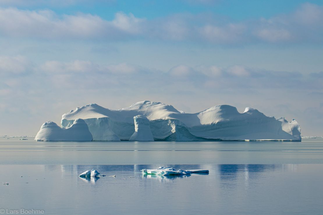 Large Antarctic iceberg with wavy contoured surface.   Credit: Lars Boehme