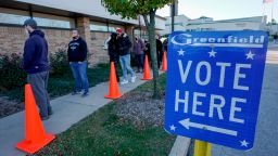 In this November 3, 2020, file photo people line up to vote outside the Greenfield Community Center on Election Day in Greenfield, Wisconsin. 