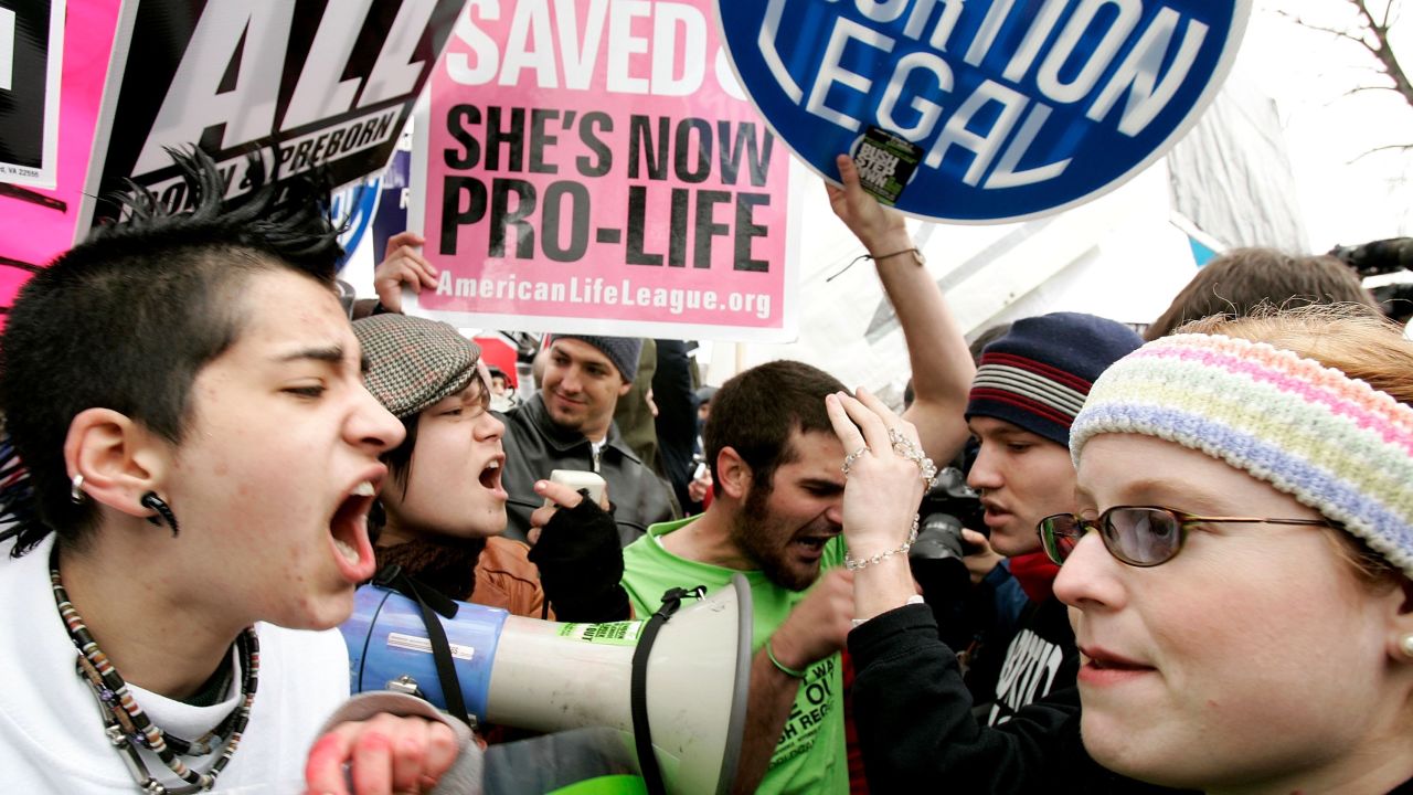 WASHINGTON - JANUARY 23: Pro-choice activists (L) argue with Pro-life activists (R) on abortion issues in front of the U.S. Supreme Court January 23, 2006 in Washington, DC. Thousands of people took part in the annual ?March for Life? event to mark the 33rd anniversary of the Roe v. Wade ruling that legalized abortion. (Photo by Alex Wong/Getty Images)