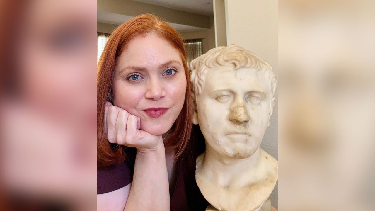Laura Young and the 52-pound bust she found in August 2018.