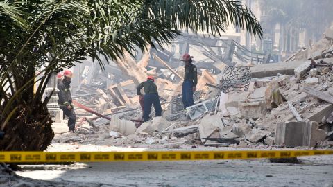 Rescue workers comb through the rubble for survivors of the Saratoga Hotel explosion in Havana on Friday.
