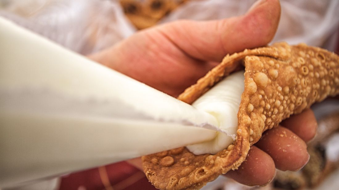 <strong>Sicilian specialty:</strong> According to legend, cannolo was first made by the concubines of an Arab emir. The women apparently came up with the idea of filling the pastry dough with ricotta.