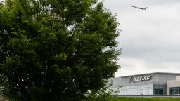 A United Airlines plane departs behind a Boeing office building in Arlington, Virginia, U.S., on Thursday, May 5, 2022. Boeing Co. confirmed today that its Arlington campus just outside Washington will serve as the companys global headquarters. Photographer: Eric Lee/Bloomberg via Getty Images