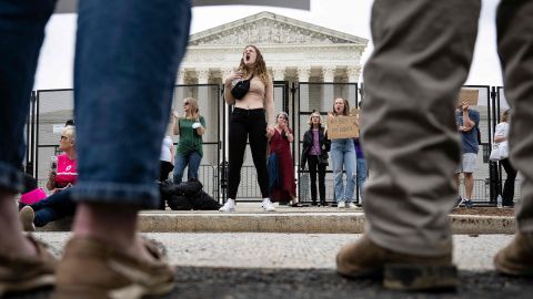 Abortion rights activists face anti-abortion rights activists in front of the US Supreme Court, May 5, 2022.