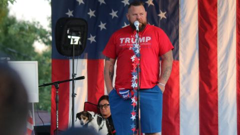 J.R. Majewski, who painted a Trump banner across his entire front yard, hosted a gathering at his home to watch the first presidential debate of 2020.
