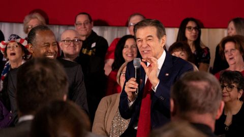 Republican Senate candidate Mehmet Oz speaks at a campaign event in Bristol, Pennsylvania, on April 21, 2022, with former US Housing and Urban Development Secretary Ben Carson, left.