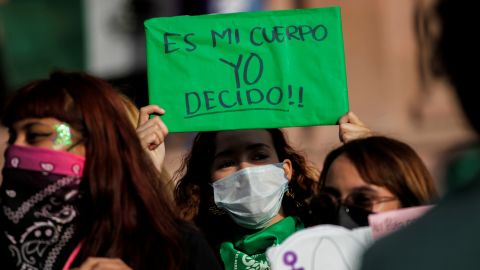 A woman holds up a banner that reads "My body, I decide" in Saltillo, Mexico, after the country's Supreme Court ruled that penalizing abortion is unconsitutional in September.
