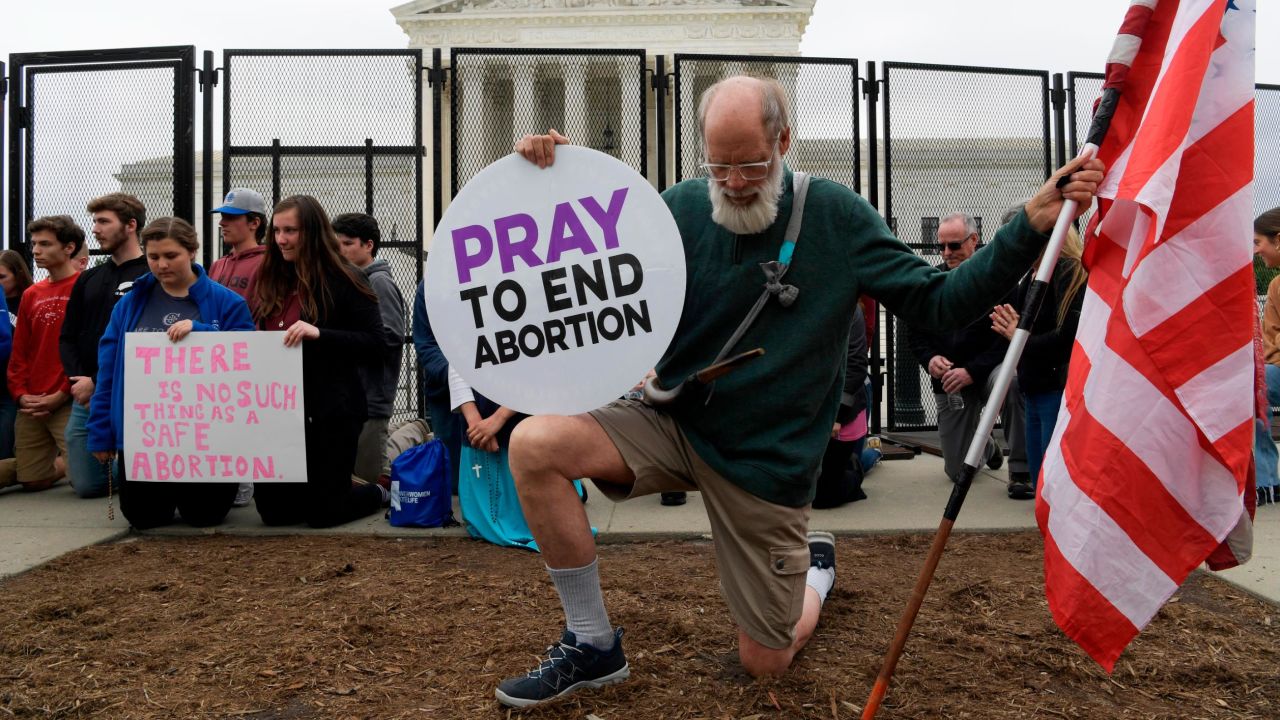 Abortion Right demonstrators and against protest in front of Supreme Court about the leak of a draft opinion that would overturn the landmark 1973 Roe v. Wade decision during a rally, today on April 05, 2022 at US Supreme Court in Washington DC, USA. (Photo by Lenin Nolly/Nur Photo via AP)