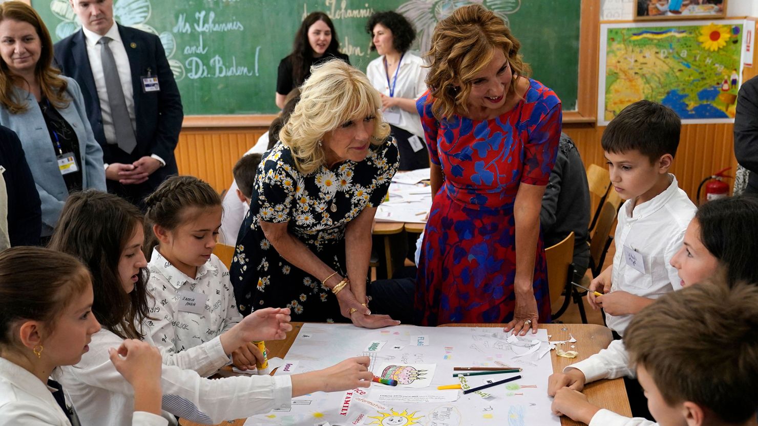 US first lady Jill Biden, center left, and Romanian first lady Carmen Iohannis visit with Ukrainian refugee students and teachers at the Uruguay School in Bucharest on May 7, 2022.