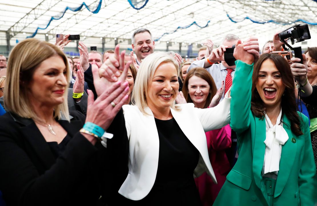 Sinn Fein's Vice President Michelle O'Neill, center, celebrates with party colleagues after being elected in Mid Ulster at the Medow Bank election count centre in Magherafelt , Northern Ireland, Friday, May, 6, 2022. 