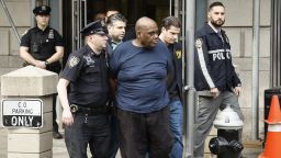 NEW YORK, NEW YORK - APRIL 13:  Suspected subway shooter, Frank James is escorted out by the FBI and NYPD officers from the 9th Precinct after having been arrested for his role in the attack at the 36th St subway  station in Brooklyn on April 13, 2020 in New York City. James allegedly shot 10 people and set off a smoke device on an N subway train during Tuesdays rush hour. (Photo by John Lamparski/Getty Images)
